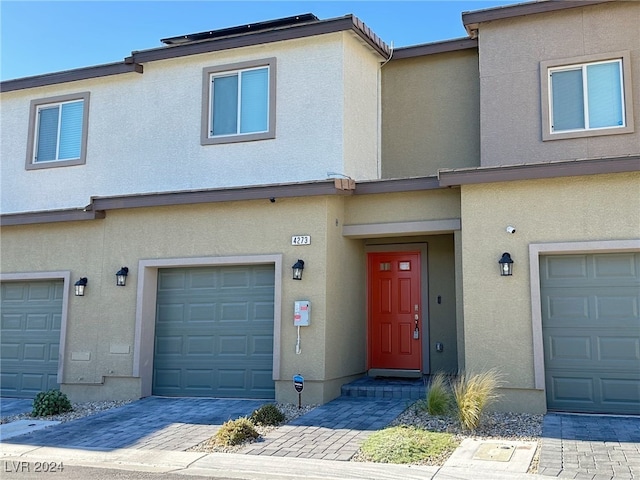 view of property featuring a garage