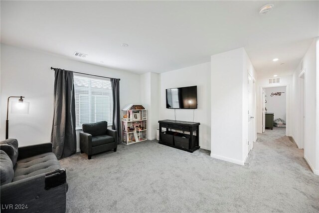 living room with light carpet