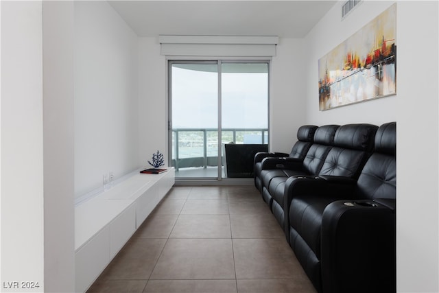 living room with tile patterned floors