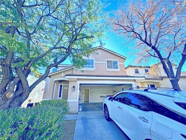 view of front of property with a garage