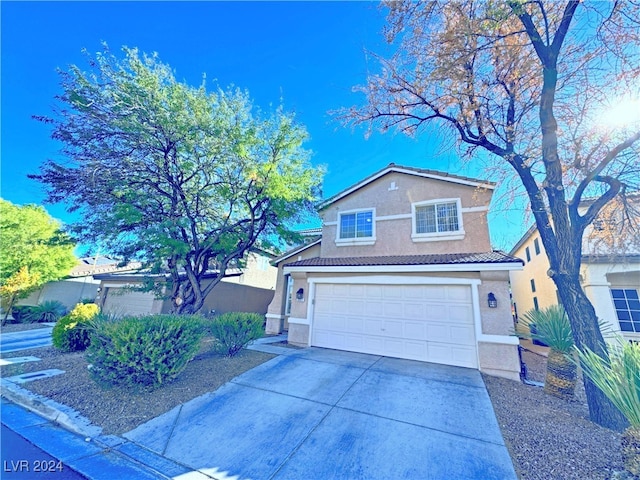 view of front property with a garage