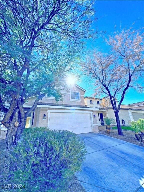 view of front of property featuring a garage