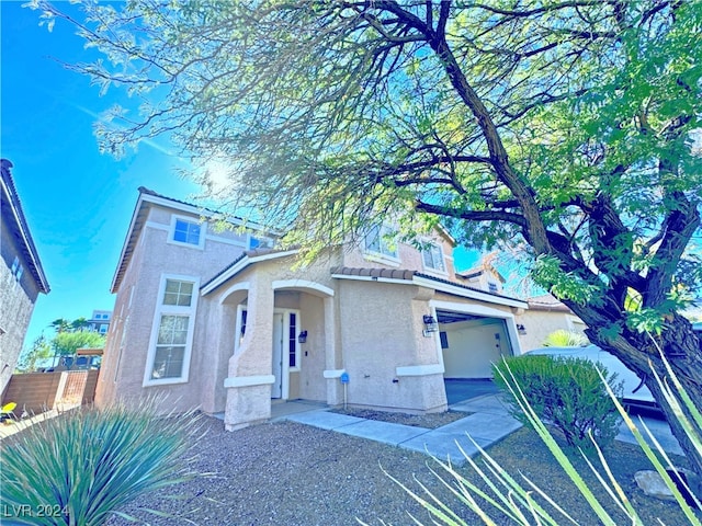 view of front of property with a garage