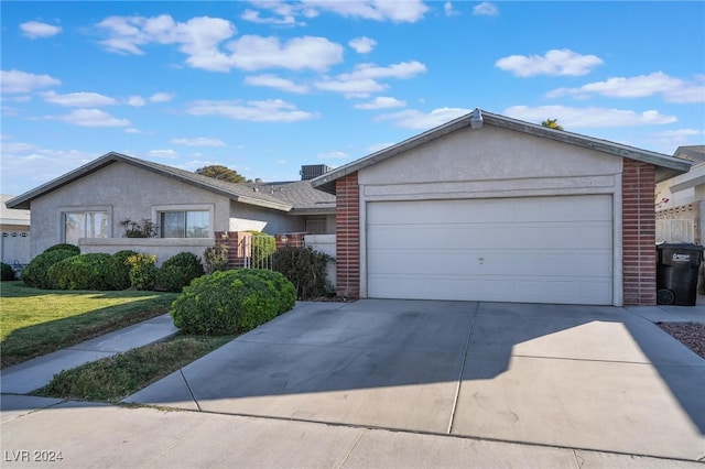 single story home with a garage