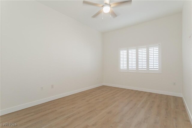 700 Carnegie St Unit 2312, Henderson, NV 89052 - empty room featuring baseboards, light wood-style flooring, and a ceiling fan