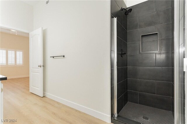 700 Carnegie St Unit 2312, Henderson, NV 89052 - full bath featuring a shower stall, wood finished floors, and baseboards
