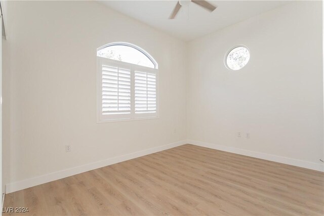 700 Carnegie St Unit 2312, Henderson, NV 89052 - spare room featuring healthy amount of natural light, a ceiling fan, light wood-style floors, and baseboards