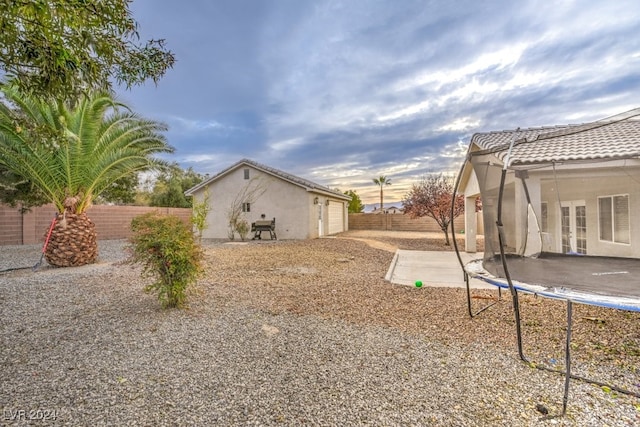 view of yard featuring a trampoline