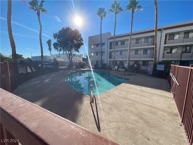 view of swimming pool with a patio area