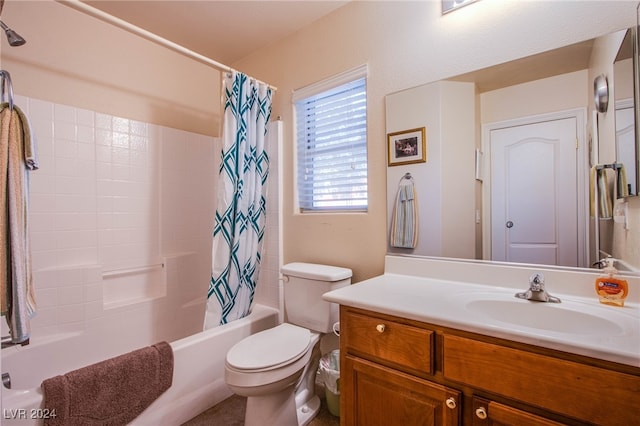 full bathroom featuring vanity, toilet, and shower / tub combo