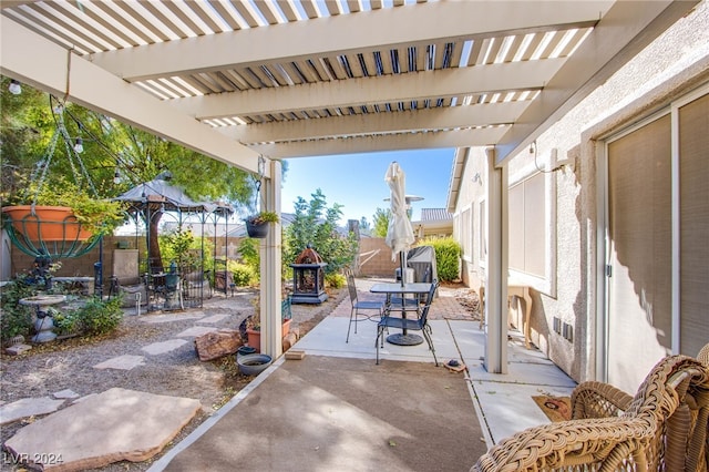 view of patio featuring a pergola