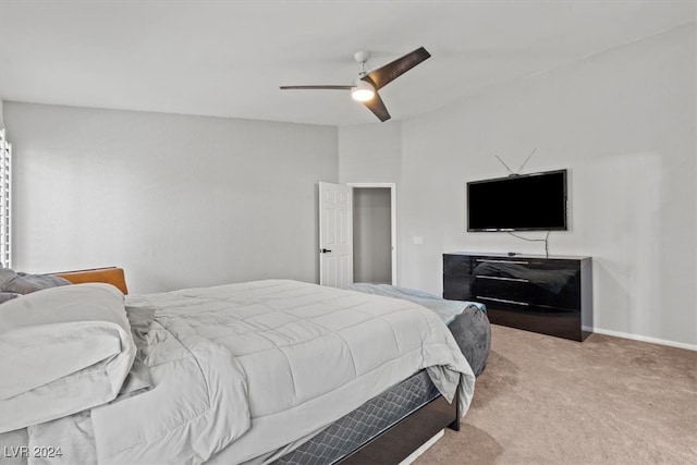 bedroom with ceiling fan and carpet flooring