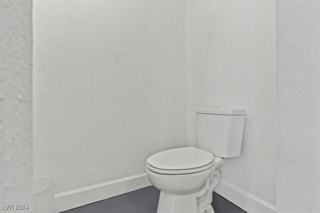 bathroom featuring toilet