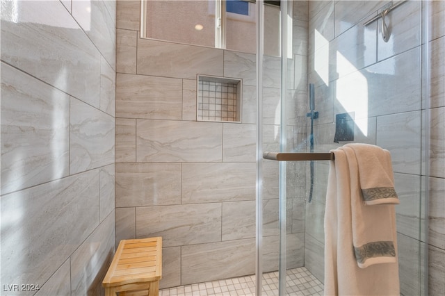 bathroom featuring a shower stall