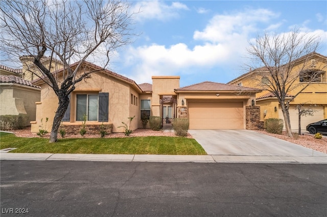 view of front of house featuring stucco siding, concrete driveway, a garage, stone siding, and a tiled roof