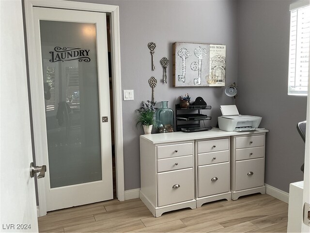 bathroom featuring wood-type flooring and vanity