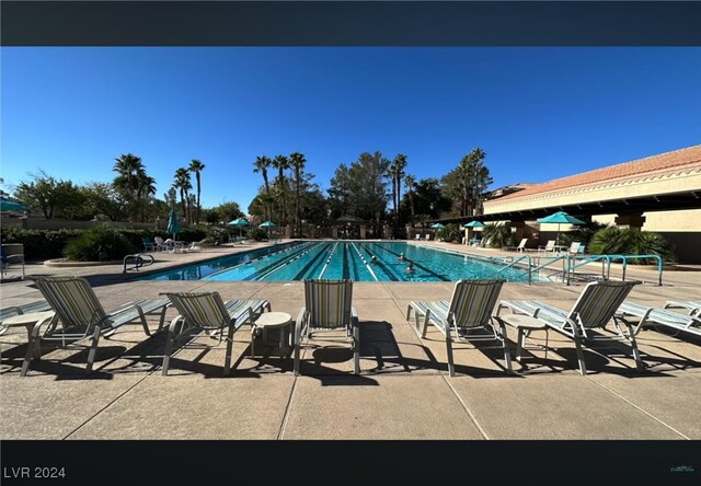 view of pool featuring a patio