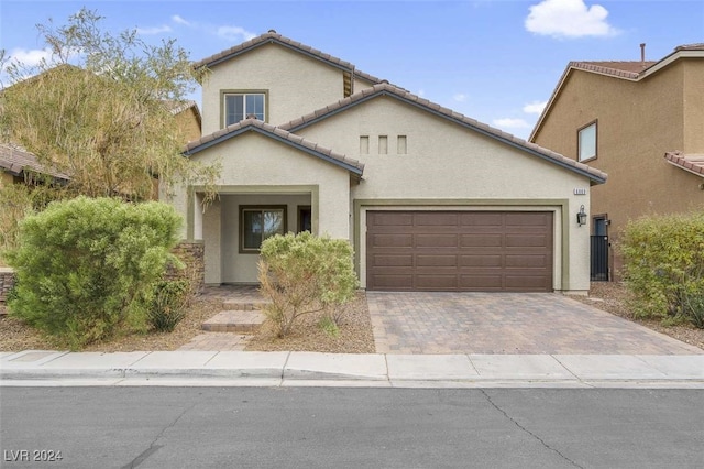 view of front of property featuring a garage