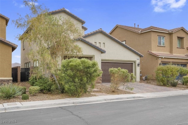 view of front of property with a garage