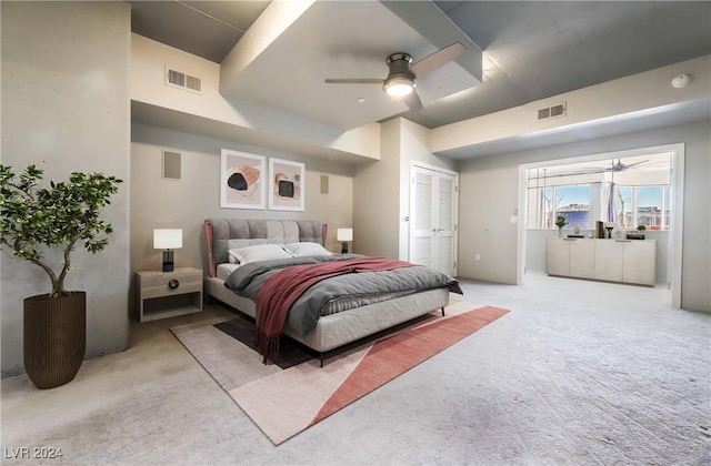 bedroom with ceiling fan and carpet flooring