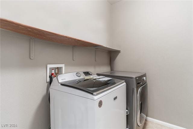 laundry room featuring independent washer and dryer