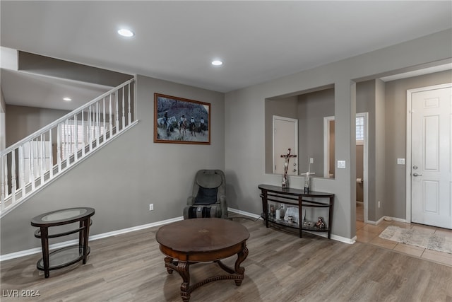 sitting room with hardwood / wood-style flooring