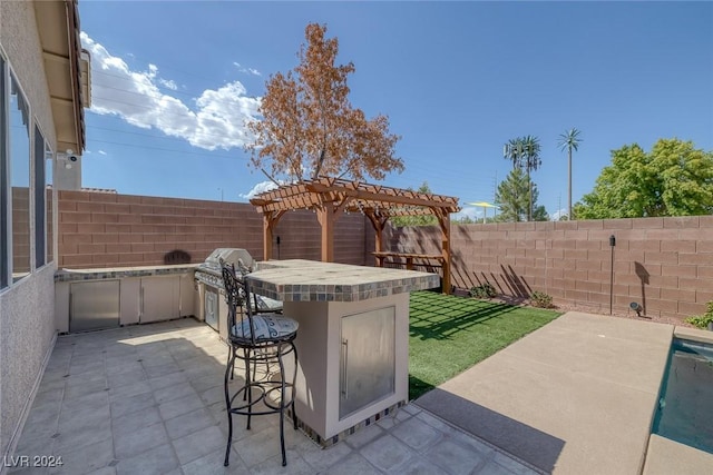 view of patio featuring a pergola and exterior bar