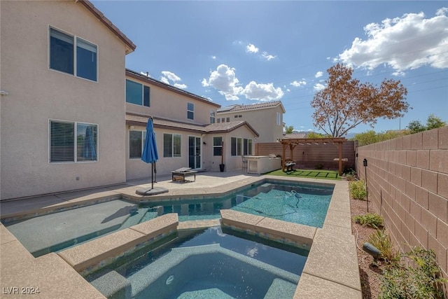 view of swimming pool with an in ground hot tub, a pergola, and a patio