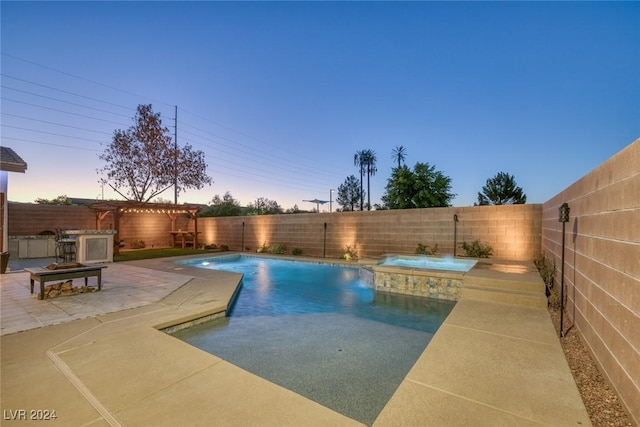 pool at dusk with pool water feature, a pergola, and a patio