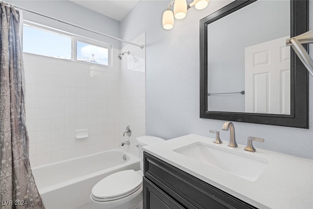 full bathroom with vanity, toilet, and shower / bath combo