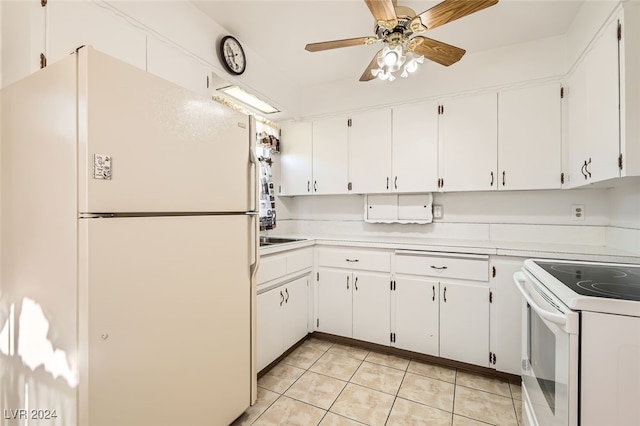 kitchen with white cabinetry, light tile patterned floors, white appliances, and ceiling fan