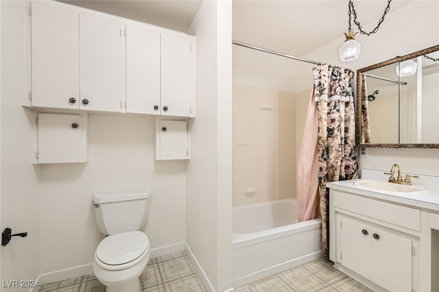 full bathroom featuring shower / bath combo with shower curtain, vanity, and toilet