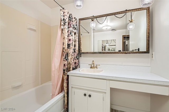 bathroom featuring vanity and shower / tub combo