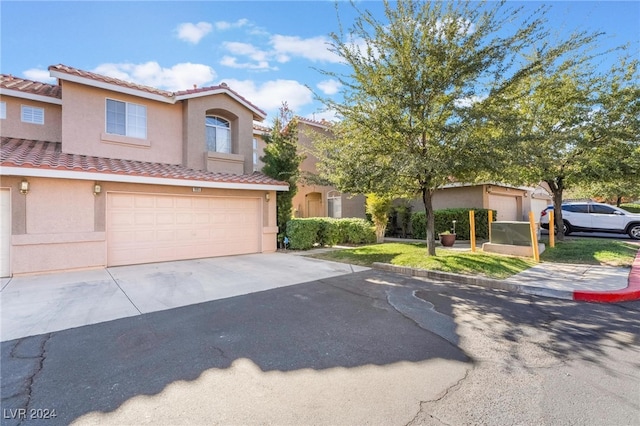 view of front of property with a garage