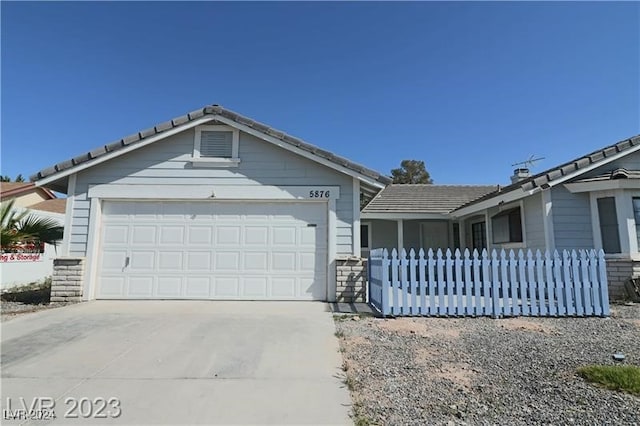 single story home featuring a garage