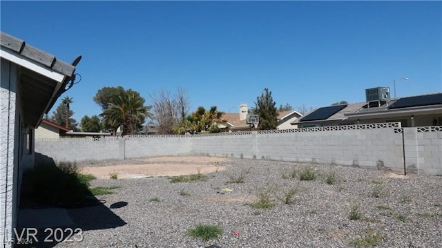 view of yard featuring central AC unit