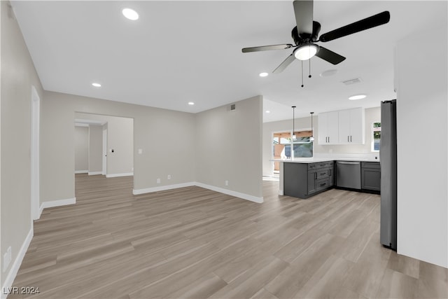 kitchen with ceiling fan, light hardwood / wood-style flooring, gray cabinets, pendant lighting, and appliances with stainless steel finishes