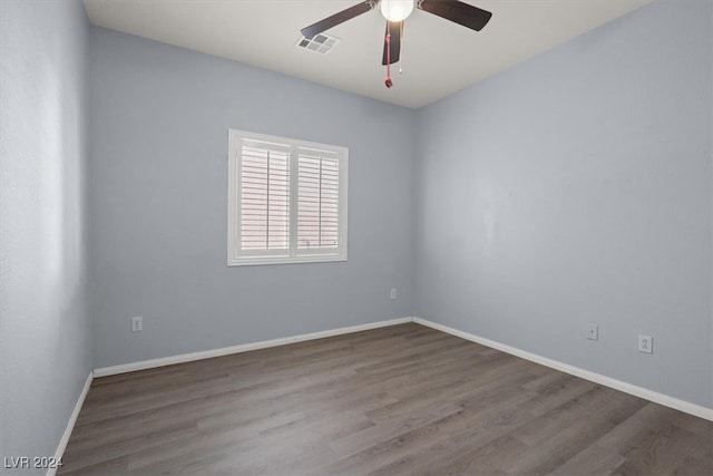 empty room with wood-type flooring and ceiling fan