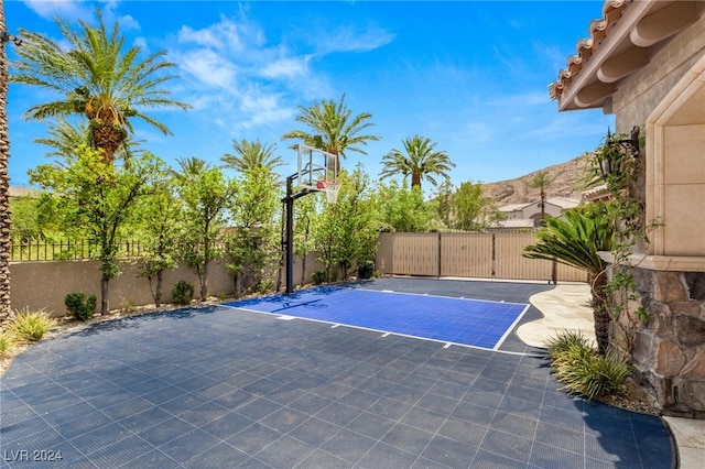 view of sport court featuring a mountain view