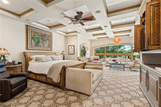 bedroom featuring ornamental molding, coffered ceiling, beamed ceiling, light colored carpet, and ceiling fan