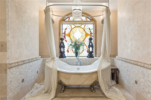 bathroom with plus walk in shower, tile walls, and tile patterned floors