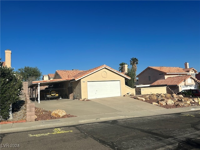 view of front of home with a carport