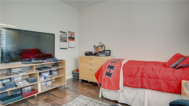 bedroom featuring dark hardwood / wood-style floors