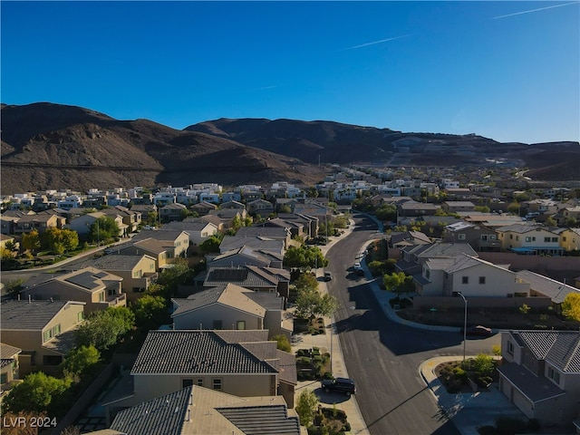 drone / aerial view featuring a mountain view