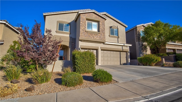 view of front of home with a garage