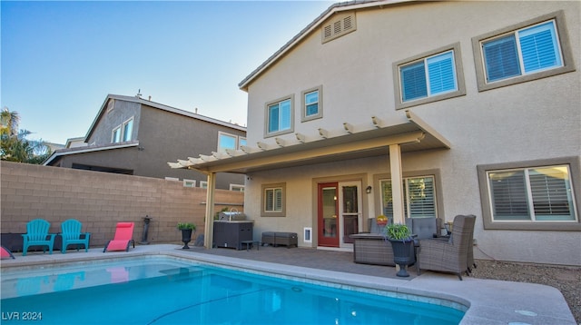 back of house featuring a patio area