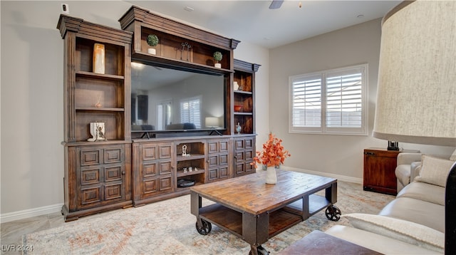 living room with ceiling fan