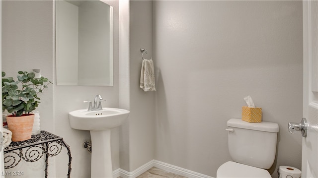 bathroom with sink and toilet