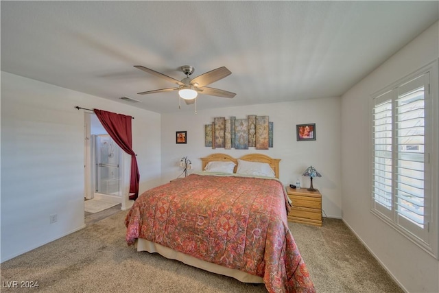 carpeted bedroom with ceiling fan, multiple windows, and visible vents