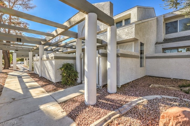 exterior space featuring a pergola